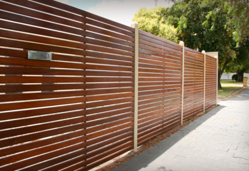 wood commercial fence, commercial fence richond, commercial fence norfolk, commercial fence raleigh, wood security fence, hurricane fence