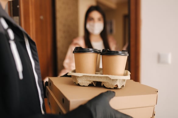 Food delivery of coffee to a woman's house