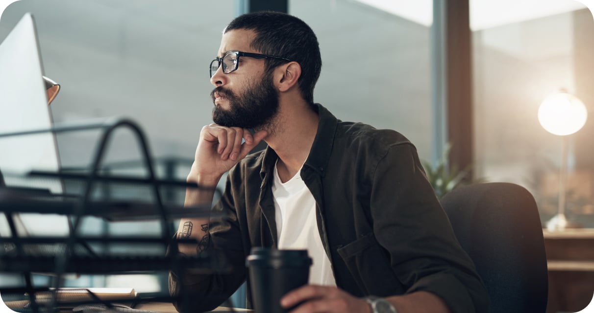 image of employee working on computer 