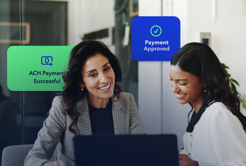 Two women discussing AP automation