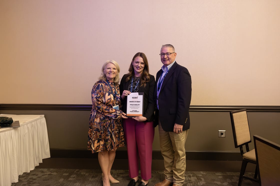 Ashely Mueller (center) receives EDEN Chair award