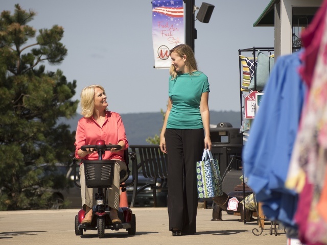 LadyOnMobilityScooter.jpg