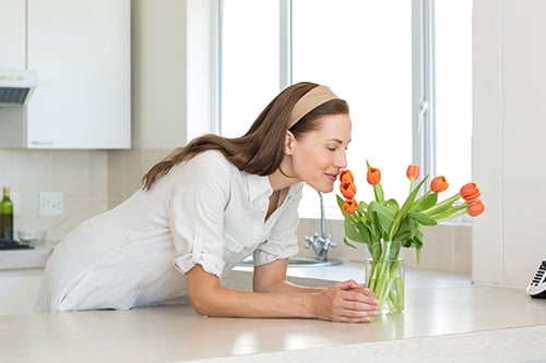 Woman Smelling Flowers.jpg