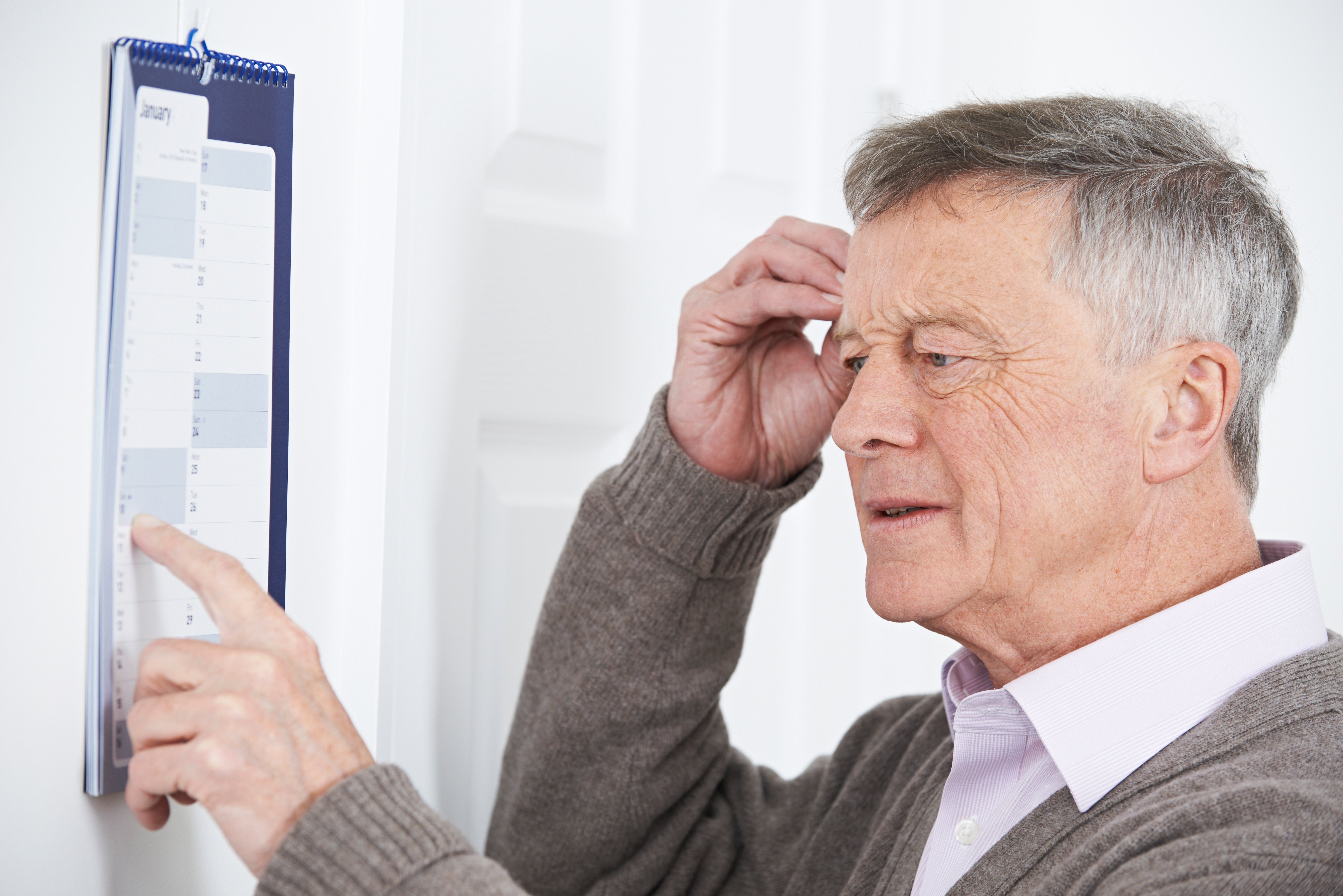 older gentleman struggling to remember