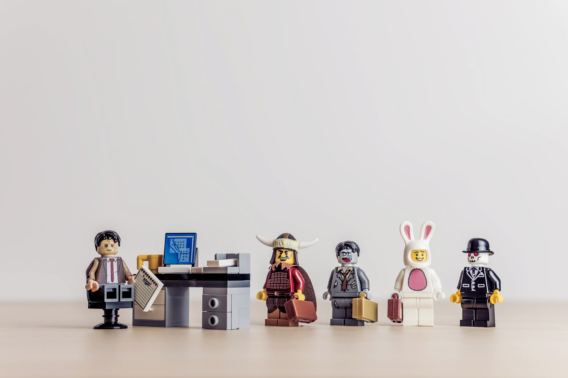 Lego figures in different costumes 