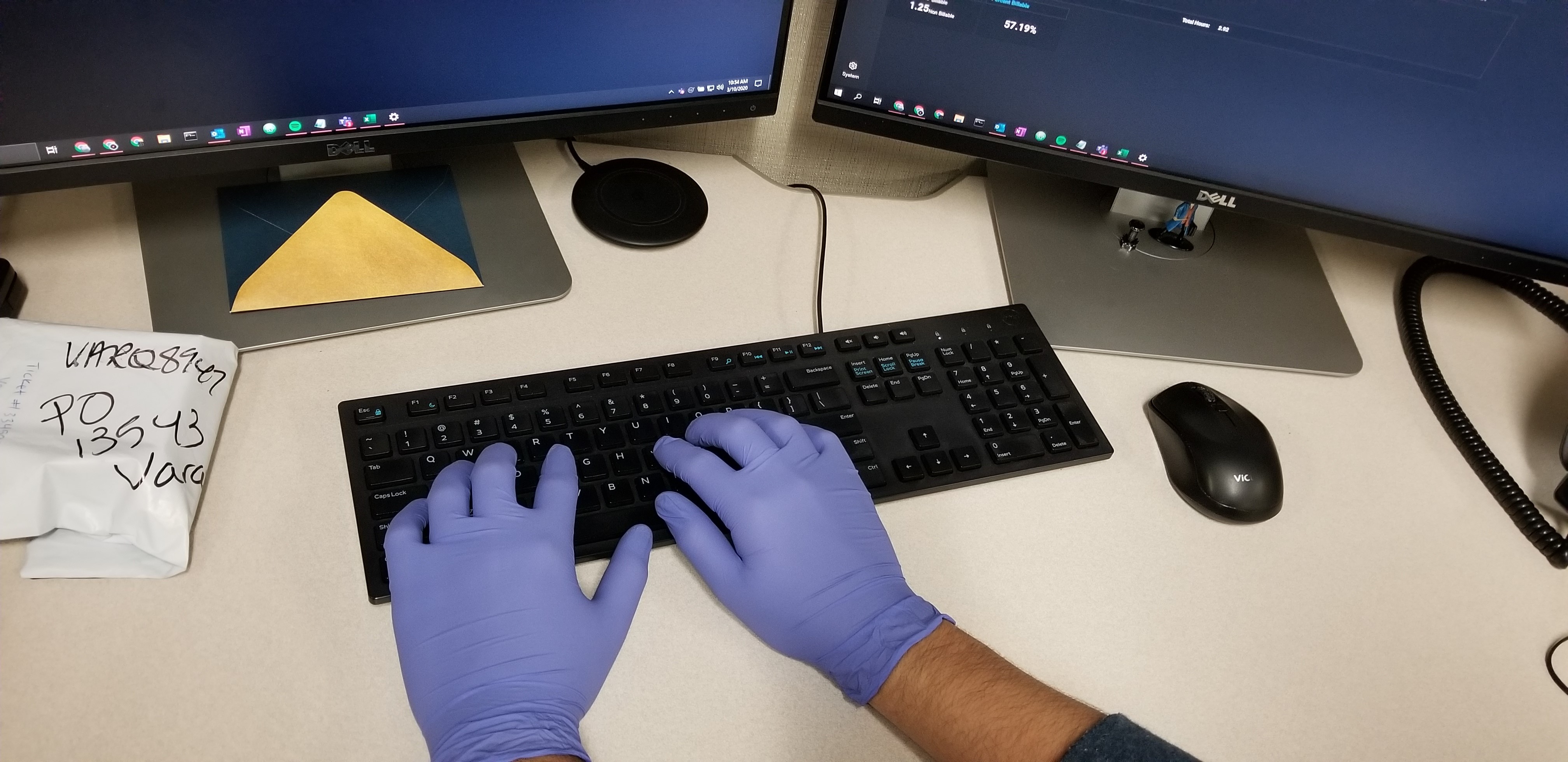 Varay Tech working with medical gloves - Varay Managed IT