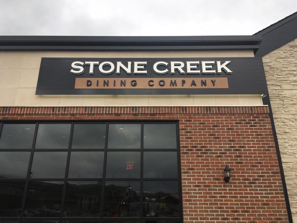 Stonecreek dining co signage