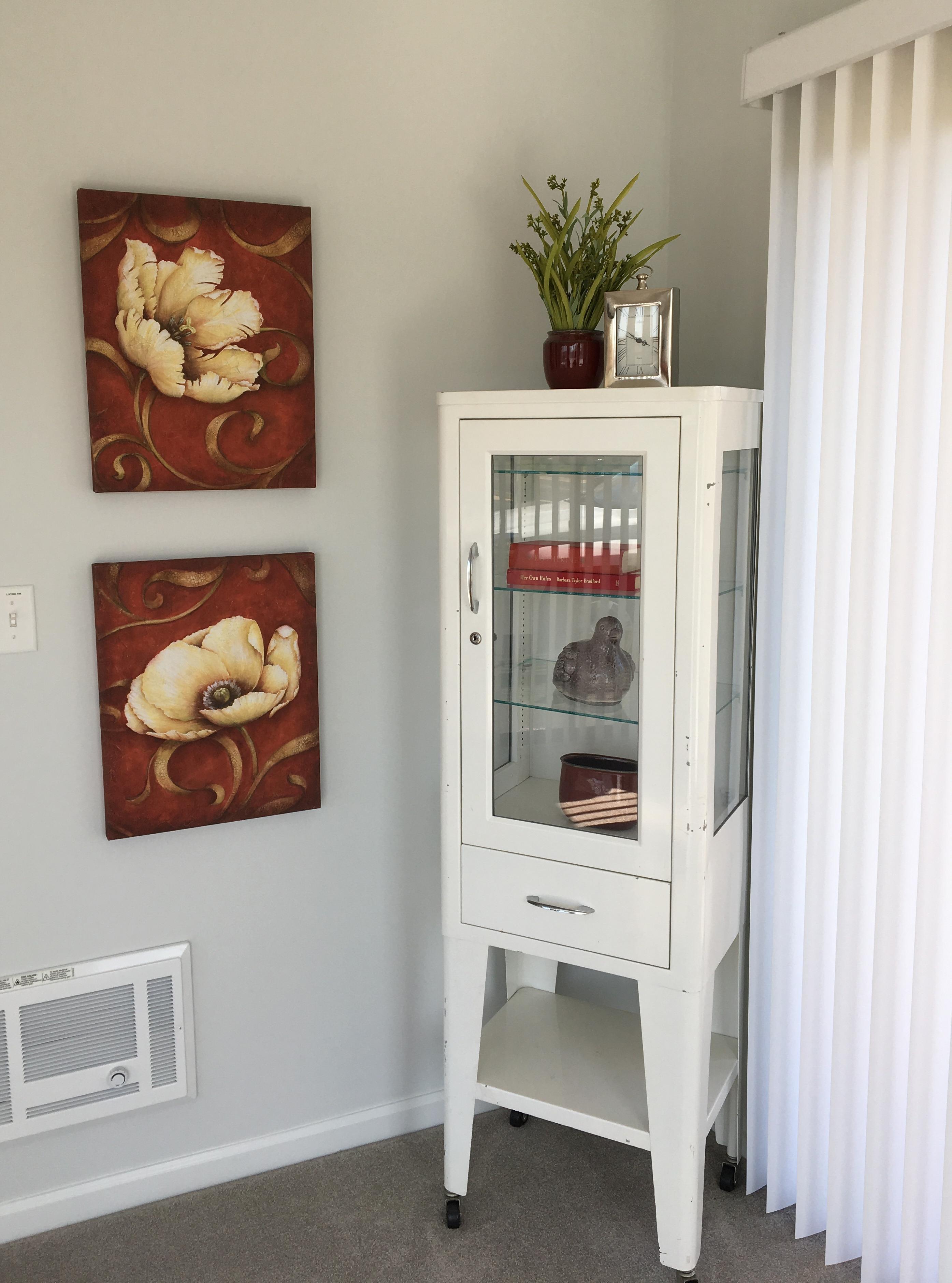 decorative cabinet with artwork