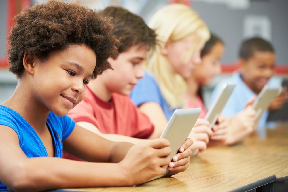 the pros and cons of technology in the classroom