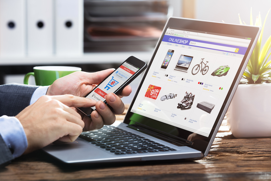 Online Shopping on Mobile phone and laptop
