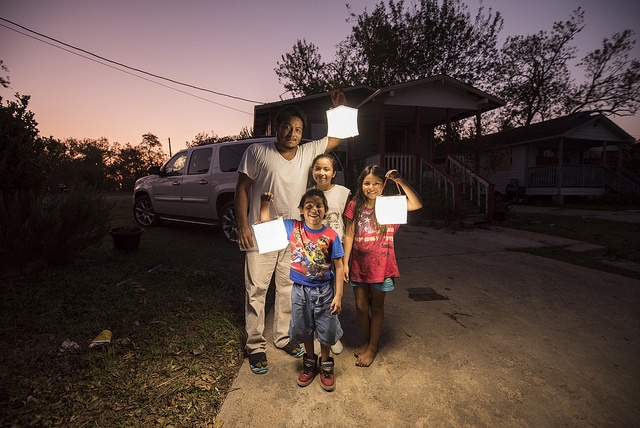 Family with lights.