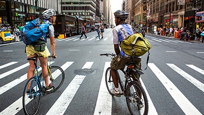 Bikers with backpacks.