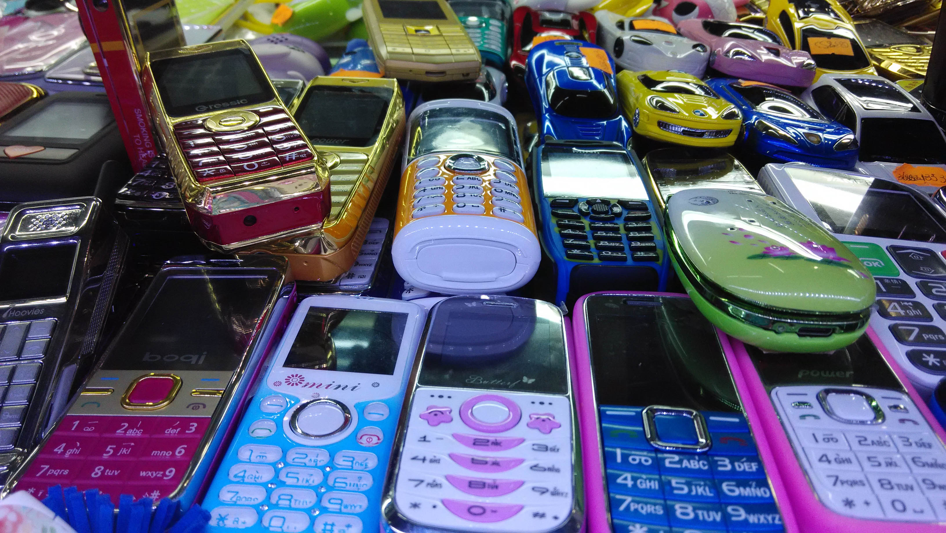 A selection of older counterfeit phones, now being phased out for super fakes