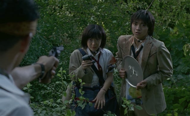 Battle Royale's Shuya and Noriko - with the chicken pot lid