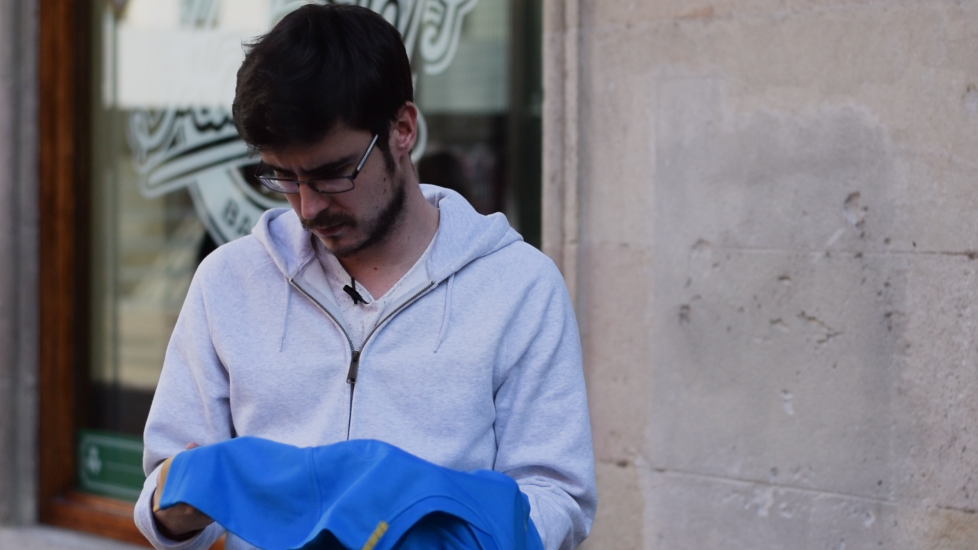 A fan investigating a fake Italian Rugby jersey