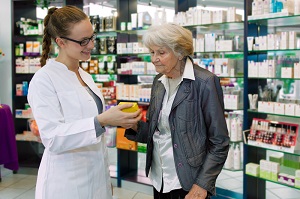 Pharmacy Tech consulting with a patient