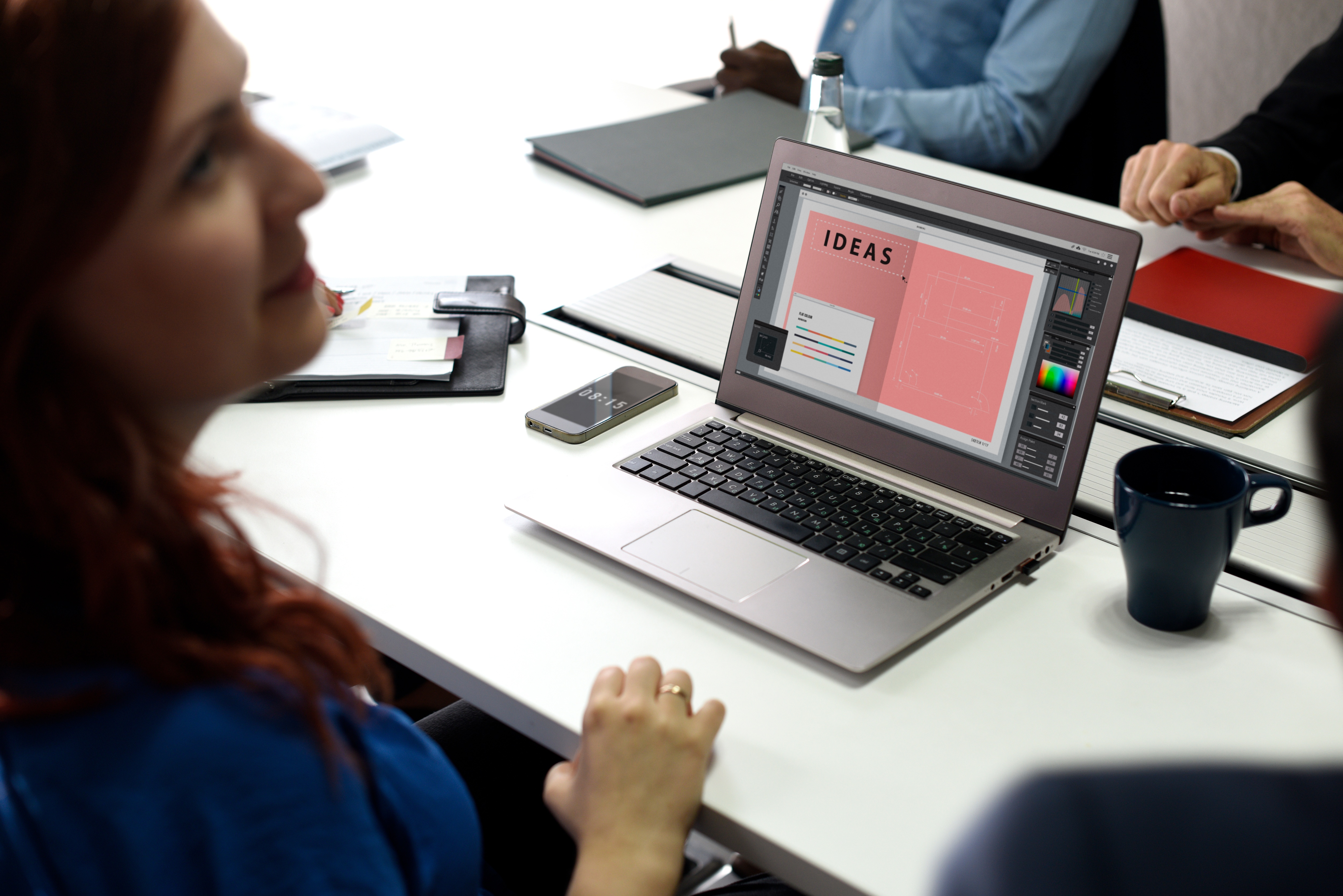 Woman brainstorming marketing plan ideas on her laptop