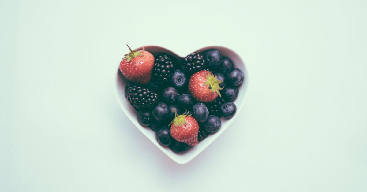 berries in heart bowl