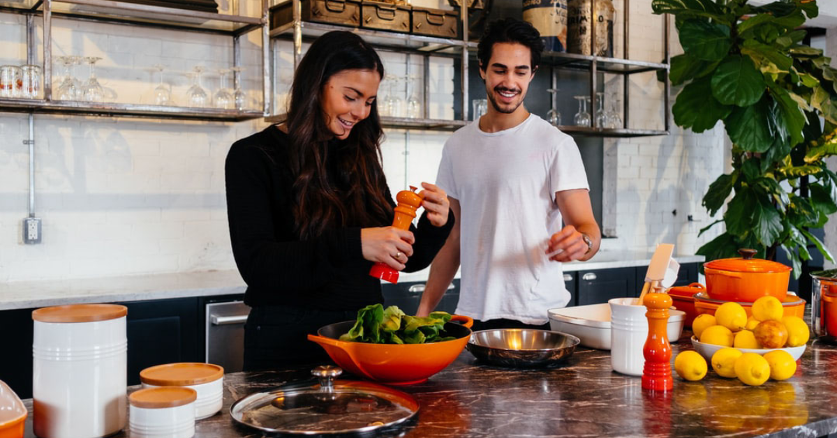couple cooking healthy meal