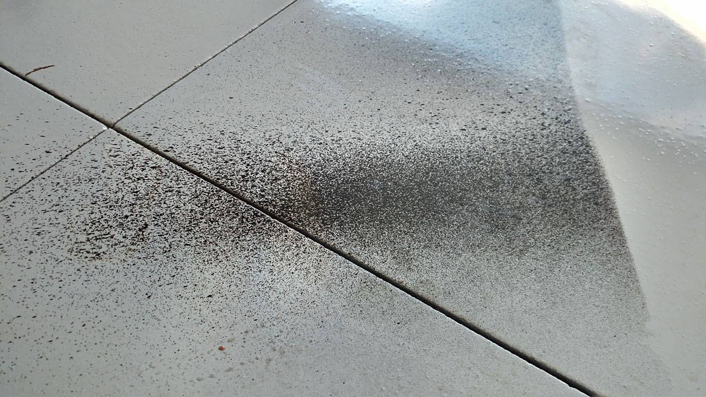Garage Floor Versus Dried On Paint, How To Clean Paint Overspray Off Hardwood Floors