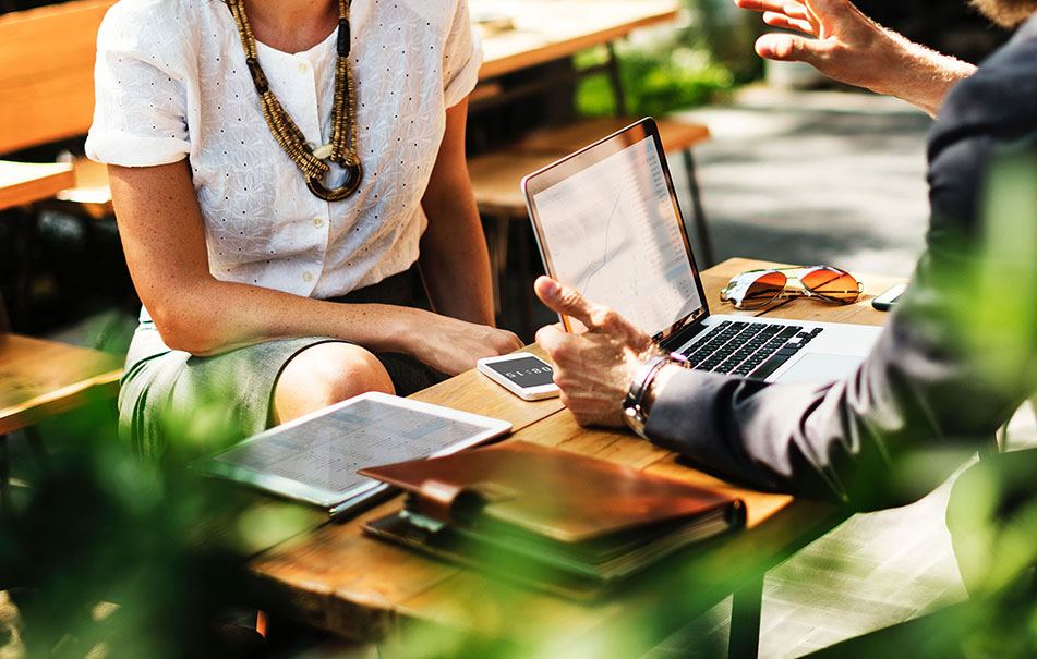 Two experienced business people having a discussion