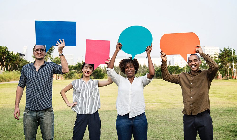 Group of people each with their own voice bubble