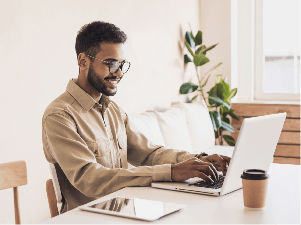 Man-Checking-Demos-on-His-Laptop