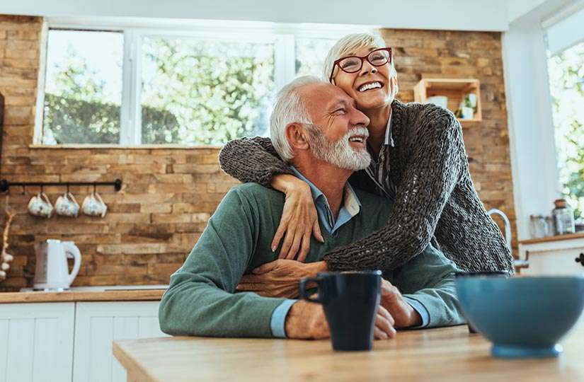 senior couple at kitchen table