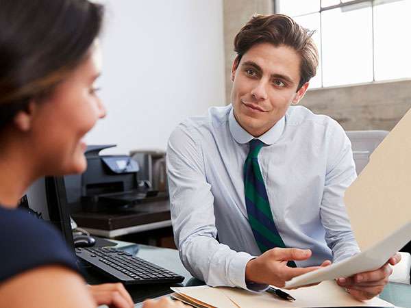 home buyer meeting with mortgage originator