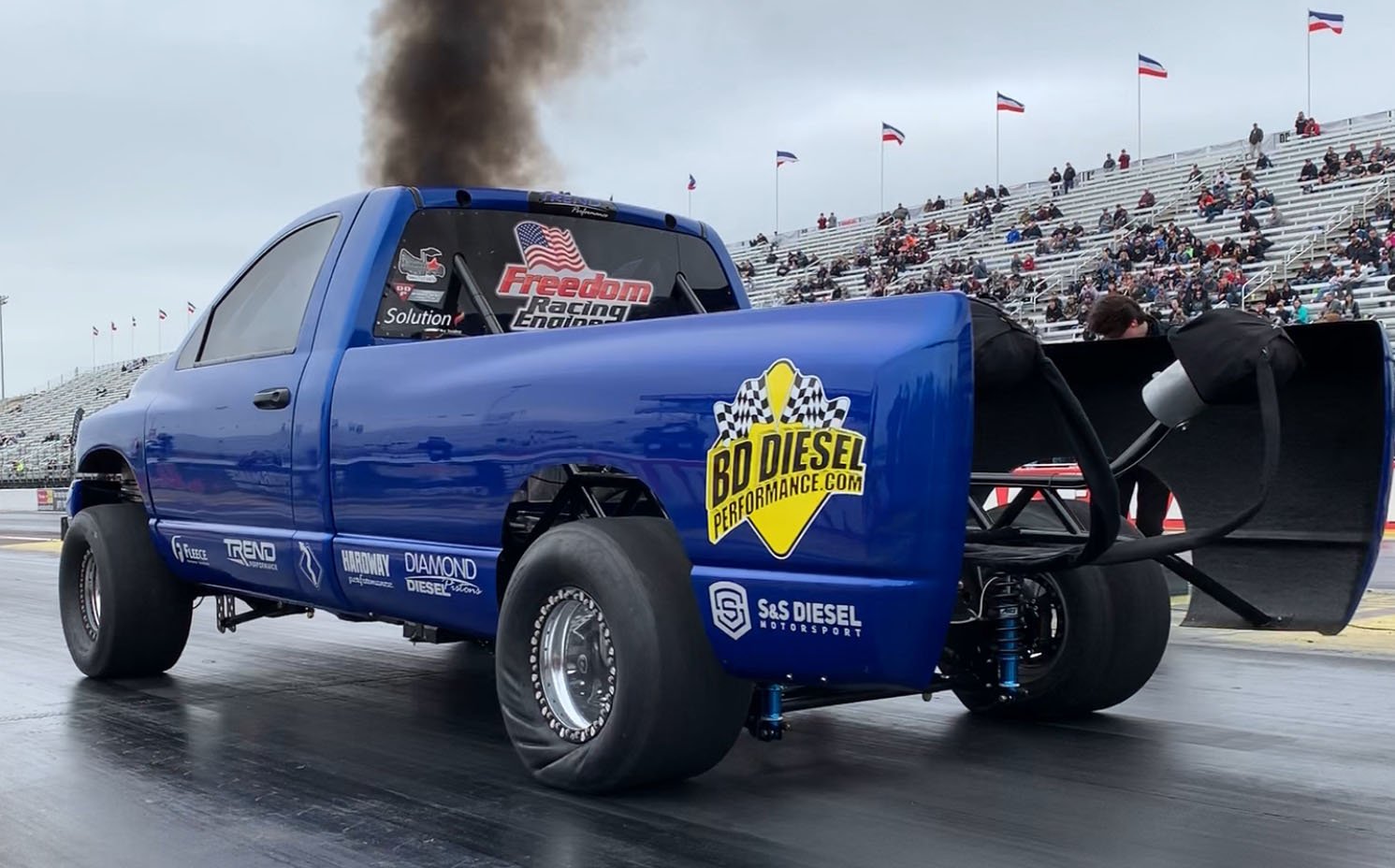 This Is How a 1500-HP Monster Truck Handles A Drag Race