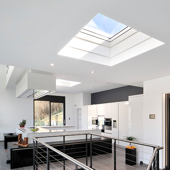 View of interior of home with large skylights and natural light