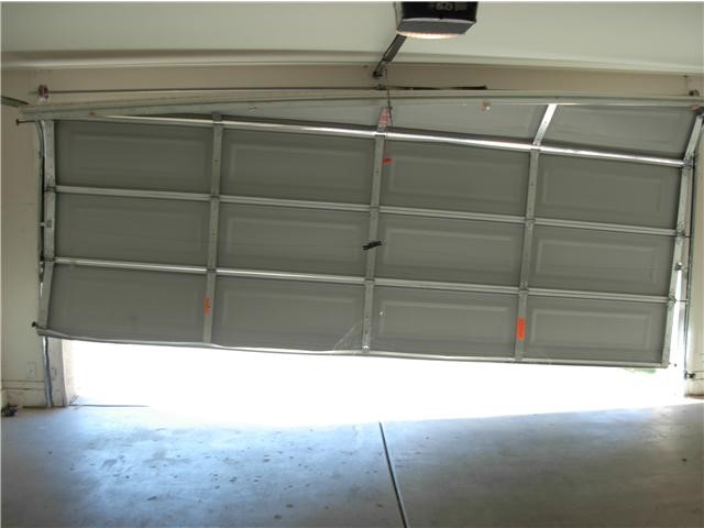 Issues With Locking Garage Doors, Garage Door Lock Cable Replacement