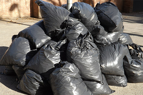 Pile of Black Garbage Trash Bags