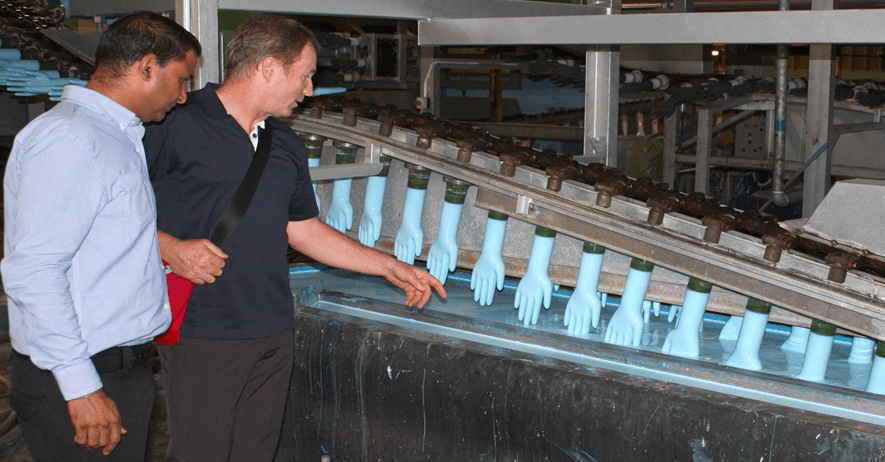 Header Image Steve Reviewing Glove Making