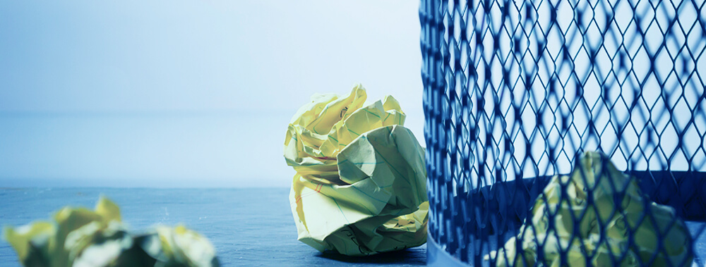 Paper balls with trash can