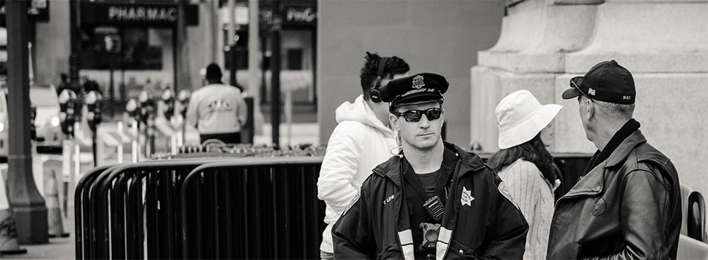 Police officer on duty outside at a special event.