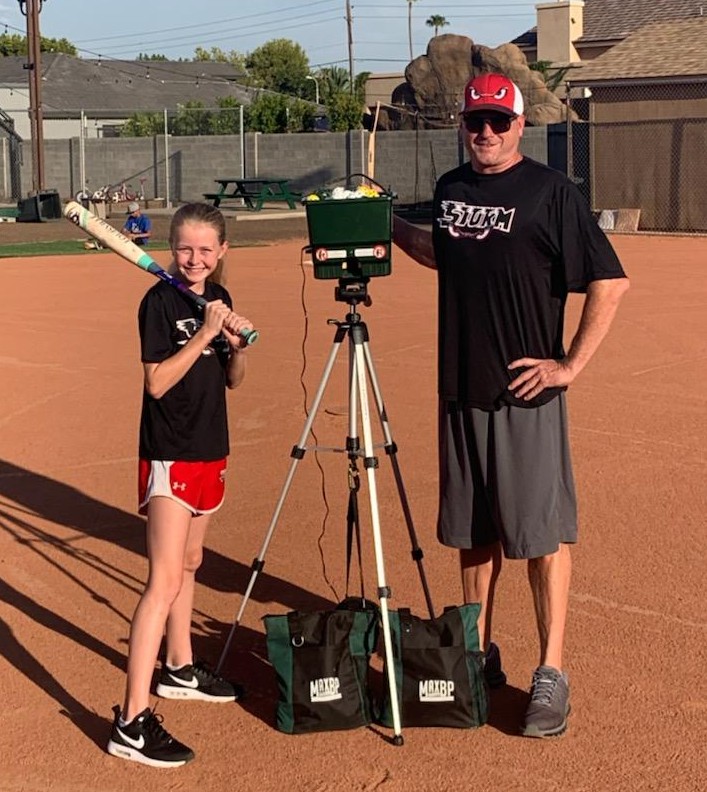 Nate Denton and his daughter Brooke have found great joy in practicing with softball drills with MaxBP.