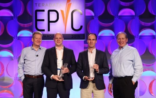 Aptitude Software's Nick Cromie and Customer Rait Randruut accept awards from Terdata's Hermann Wimmer (Co-President) and Mike Koehler (CEO)