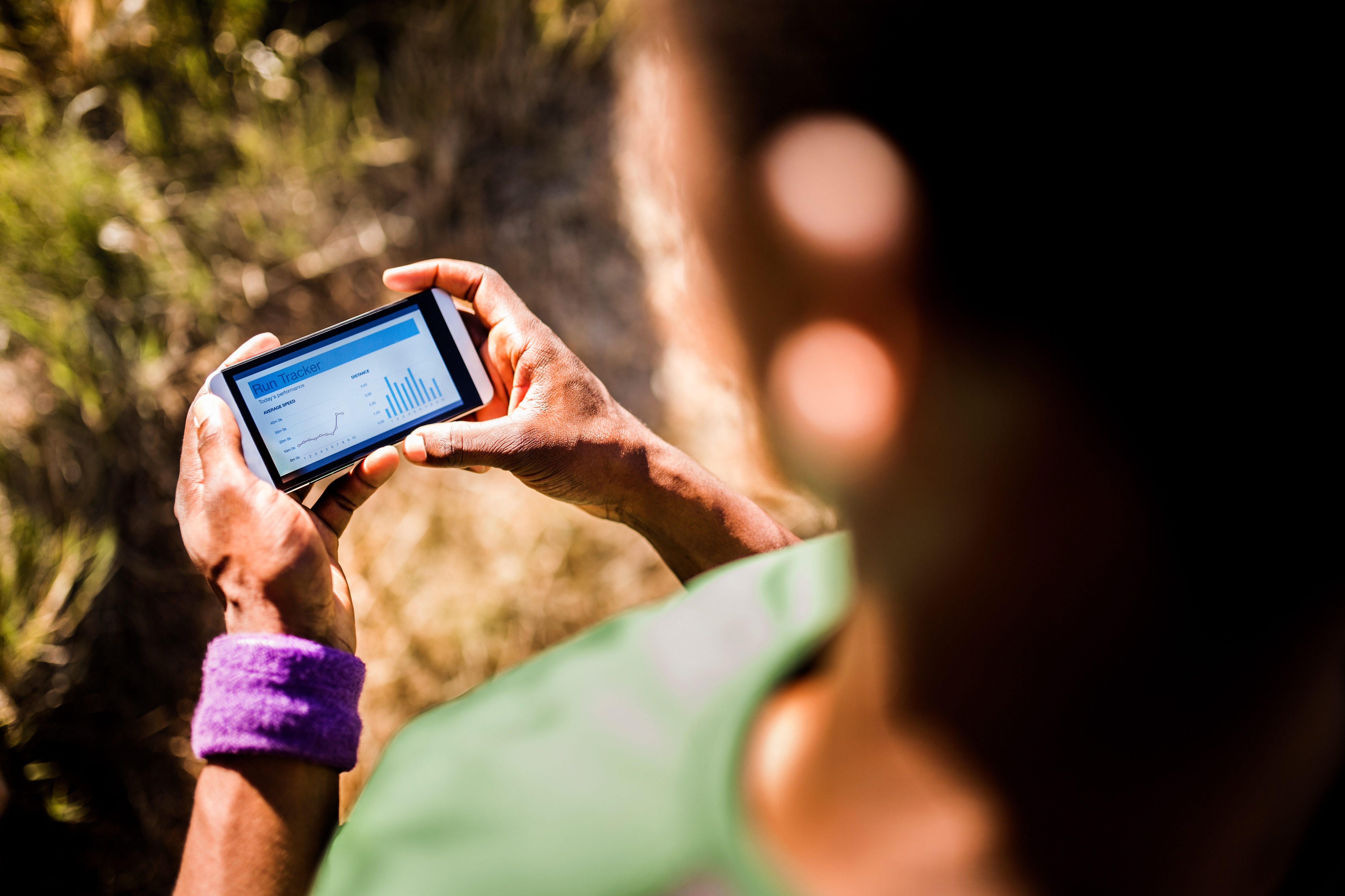 Man checking running app on phone