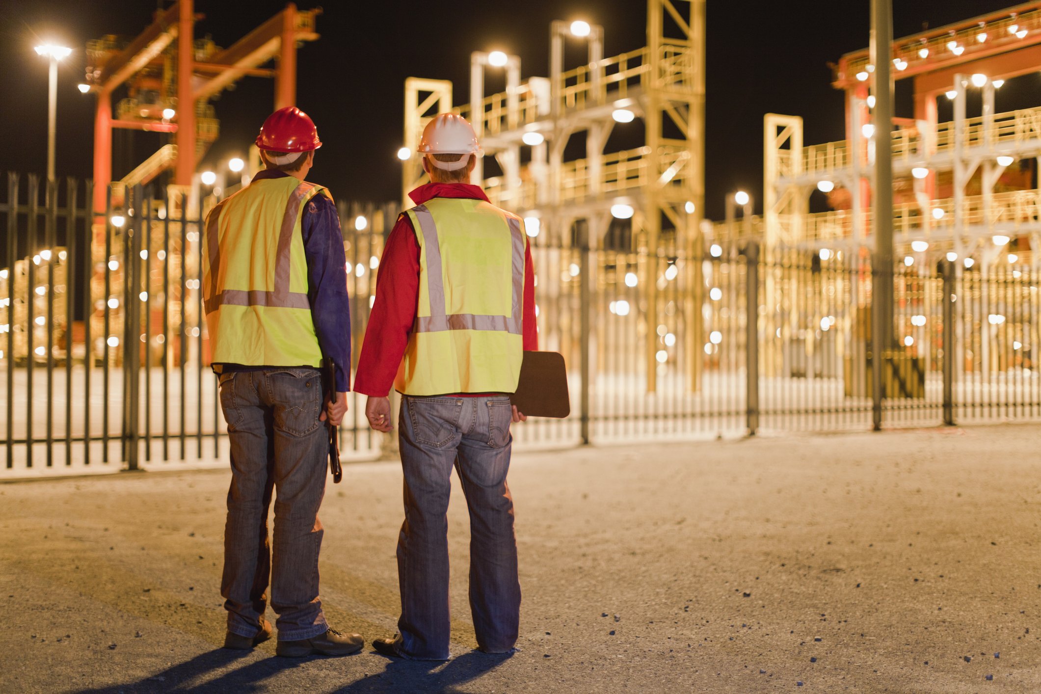 Workers standing in a shipyard