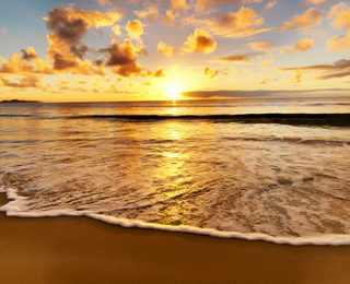 Beautiful beach sunrise at The Admiral at the Lake