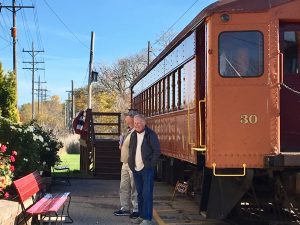 Two gentleman wondering about Chicago going to attend the cultural activities nearby