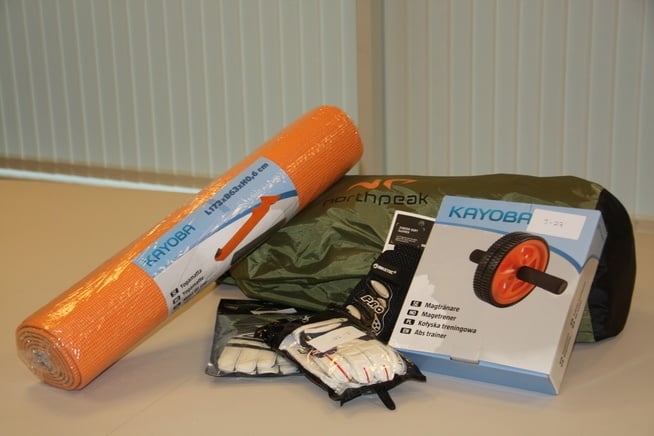 Examples of toxic material products including an orange camping mat goalkeeper gloves a green satchel and an orange wheeled toy