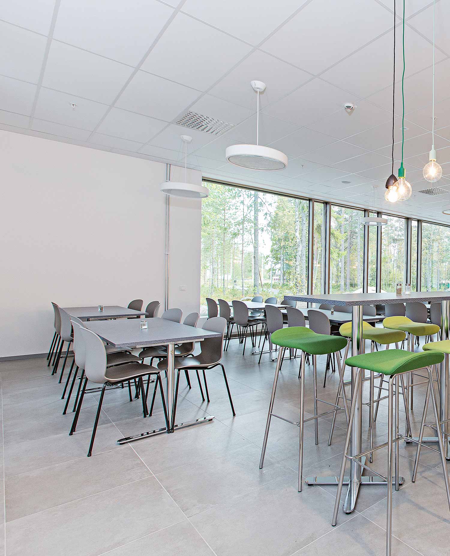 Light grey RBM Noor chairs in Minerva High School social area for eating