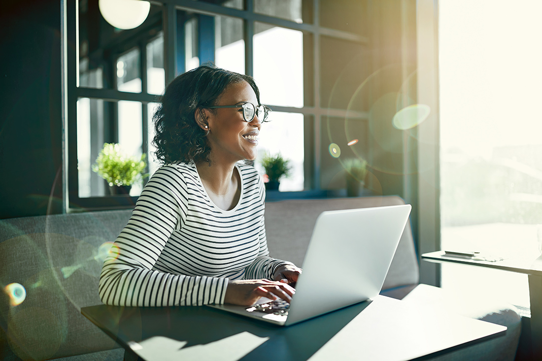 laptop-smiling-woman-working-from-home