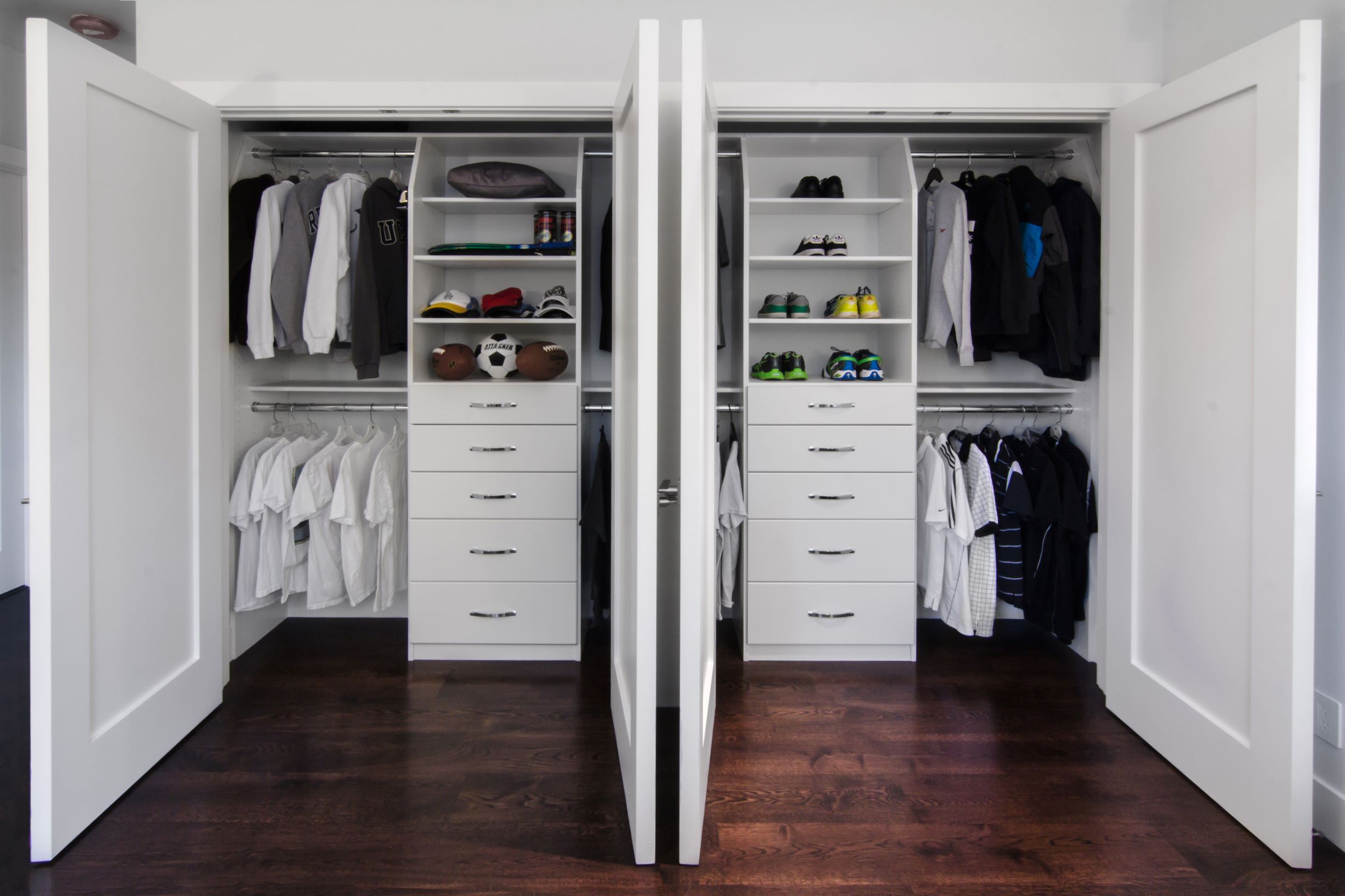 Walk In Closet with wall of Mirrored Wardrobe Cabinets - Transitional -  Closet