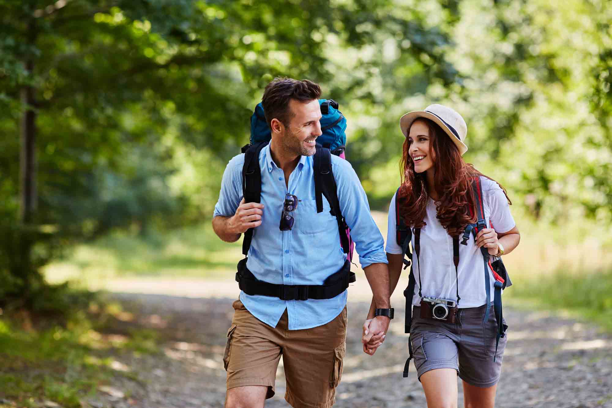 Couple hiking with backpacks