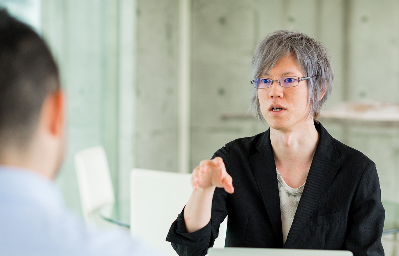 写真:シニアエンジニア 半田惇志