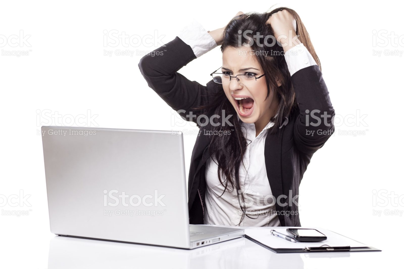 Frustrated business person yells at her computer