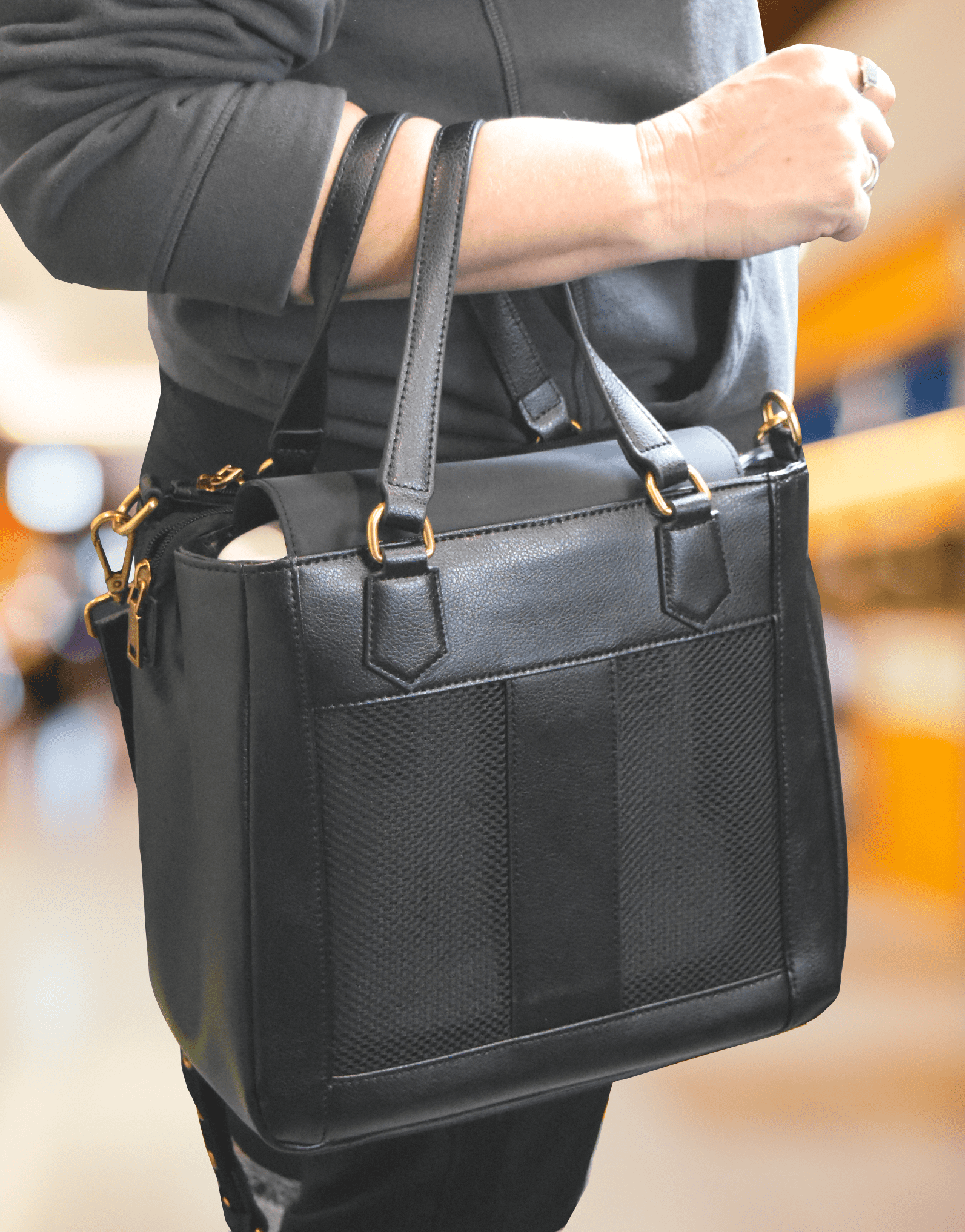 Woman carrying GO2 carryall
